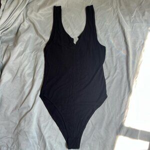 Out from under bodysuit